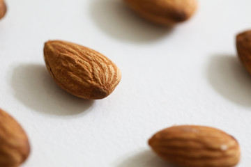 Roasted almonds isolated on white background