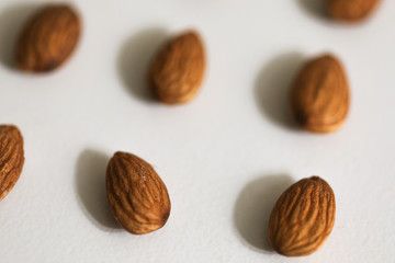 Roasted almonds isolated on white background