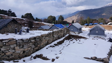 Snow and camps and the mountain with bright sunshine mornings