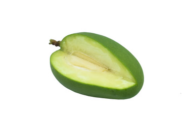 Quarter of a green colored mango placed over white isolated background