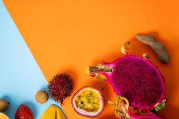 Exotic fruits on colored background