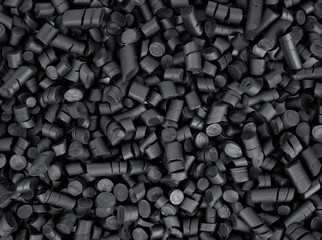 Fototapeta na wymiar Black rubber granules