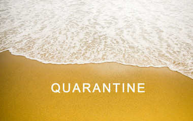 Beautiful sea coast with quarantine text. No summer travel concept. Consequences of coronavirus people isolation.