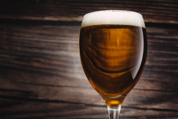 Glass of beer on wooden	