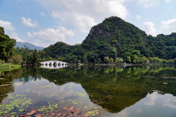 Fototapeta na wymiar Seven Stars Cave Scenic Park in Zhaoqing City of Guangdong Province centers around the Star Lake and the Seven Peaks