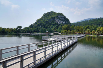 Seven Stars Cave Scenic Park in Zhaoqing City of Guangdong Province centers around the Star Lake and the Seven Peaks