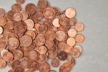 pile of coins on concrete background