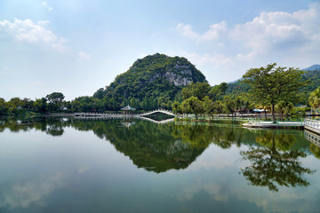 Fototapeta na wymiar Seven Stars Cave Scenic Park in Zhaoqing City of Guangdong Province centers around the Star Lake and the Seven Peaks