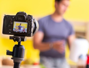 Young man blogging about food supplements