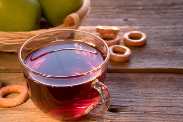 tea with sushi on a wooden table