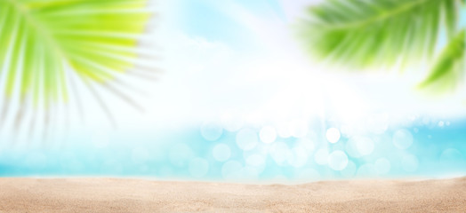 Summer tropical sea with beach, palms and blue sunny sky
