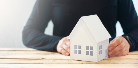 Paper house. Property protection concept, home insurance