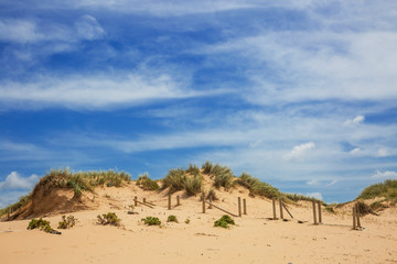 Dunes and sea landscape at the Amoreira beach in Portugal