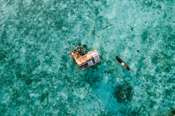 Semporna, Sabah, Malaysia - 26 April 2020 - Aerial shot of sea gypsies house by the sea
