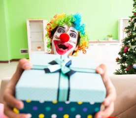 Funny clown in Christmas celebration concept