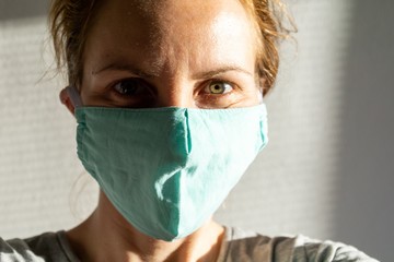 Woman in the respirator mask in the nature. Slovakia