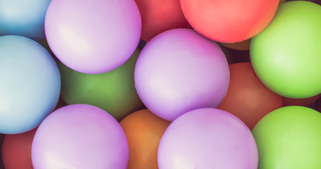 Fototapeta na wymiar Background of colorful plastic ball