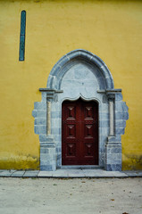 Yellow house with red door in Sintra Portugal