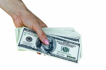 The isolated bundle of united states hundred dollar notes holding in woman right hand on white background