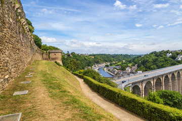 Fototapeta na wymiar Dinan, France. Beautiful landscape with a medieval fortress wall