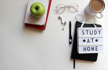 Workspace with cup of coffee. Study at home. Flat lay concept. Selective focus.