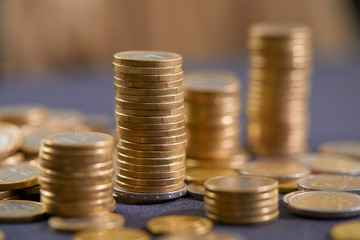 Stock Photo - Euro coins. Euro money. Euro currency.Coins stacked on each other in different positions. Money concept
