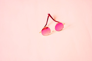 Glasses isolated on pink background
