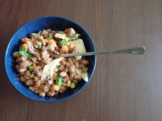  bowl of beans vegetable salad with cheese