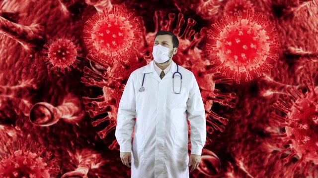 A medical worker fights viruses and disperses them with his hands.