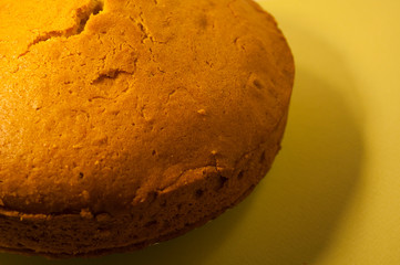 homemade cake closeup on yellow background