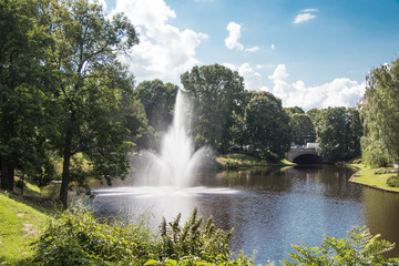 Obraz premium City canal flowing in the center of Riga, the capital of Latvia.