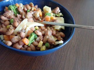  bowl of beans vegetable salad with cheese