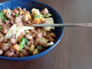  bowl of beans vegetable salad with cheese