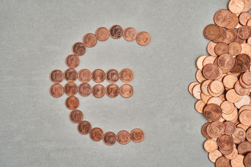 euro sign on top of concrete