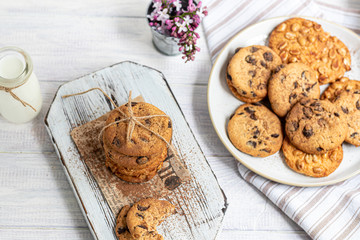 Chocolate Chip Cookies. Homemade baking. Round shape, medium size. On a white wooden background.