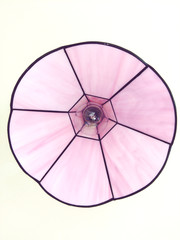 underside view of pink and black petal style lampshade