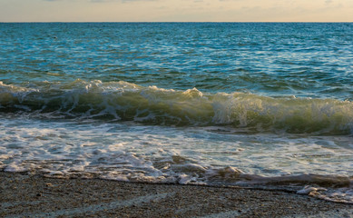 Amazing sea sunset, the sun, waves, clouds