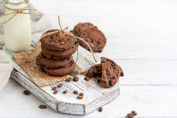 Chocolate Chip Cookies. Homemade baking. Round shape, medium size. On a white wooden background.