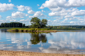Landscape with river and reflections in the water