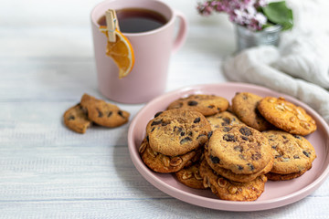 Chocolate Chip Cookies. Homemade baking. Round shape, medium size. On a white wooden background.