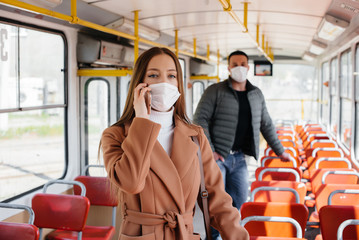 Passengers on public transport during the coronavirus pandemic keep their distance from each other. Protection and prevention covid 19