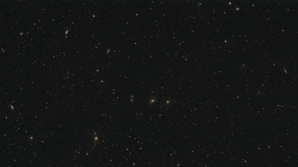Galaxies forming the Markarian's Chain as part of the Virgo Cluster in the constellation Virgo photographed from Schmalenberg in Germany.