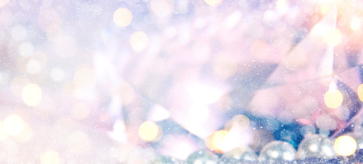 Blurred background with bokeh. Christmas and Happy New Year greeting card.