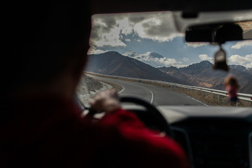 view of the mountain road from the car
