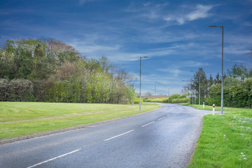 Fototapeta na wymiar Stewarton Road from Irvine at Perceton a normally busy Roadway but Deserted During Covid Lockdown.