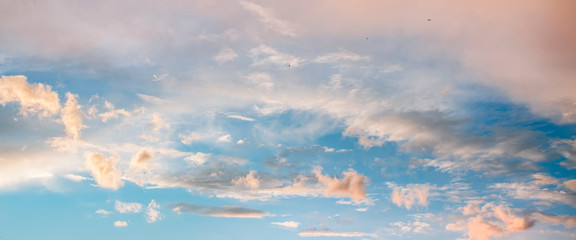 Beautiful sunset sky. Dramatic colorful clouds after sunset. Nature backgrounds