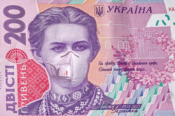 Banknote of 200 hryvnia, depicting Lesya Ukrainka in a medical mask during the economic crisis and pandemic of the coronavirus. Qualitative montage closeup.