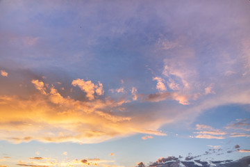 Beautiful bright sunset sky.  Dramatic colorful clouds after sunset. Nature backgrounds
