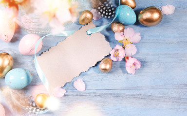 Easter background with Easter eggs and spring flowers