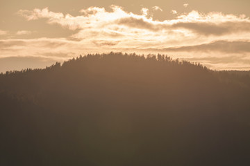 Sunset view over small mountains.